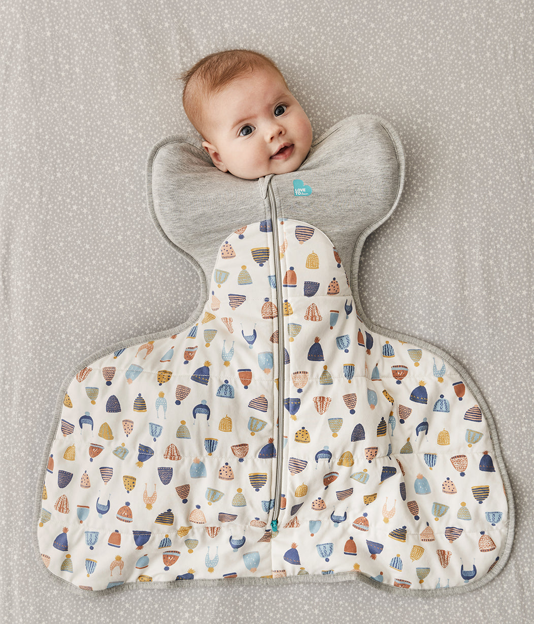 Swaddle Up™ Warm Hip Harness Happy Hats Print White